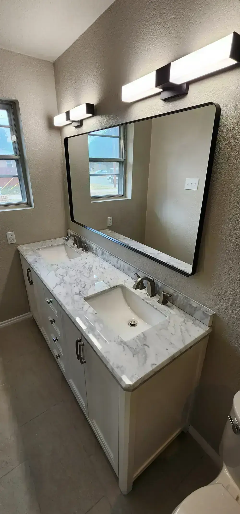 Tiled walk-in shower by BNB Concepts